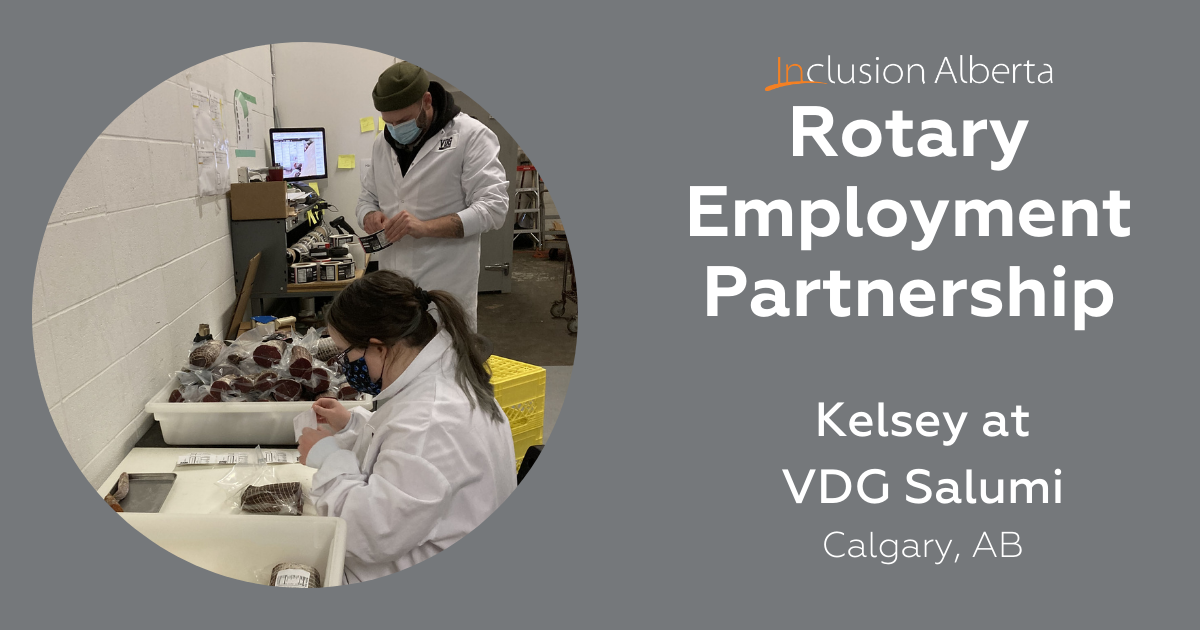 Rotary Employment Partnership: Kelsey at VDG Salumi. Kelsey sits in a white lab coat packaging product with a coworker in the background