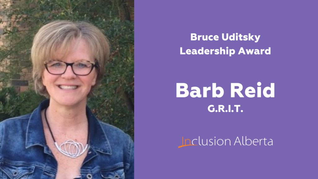 Barb Reid, GRIT Program, Bruce Uditsky Leadership Award. Barb poses wearing a jean jacket and glasses.