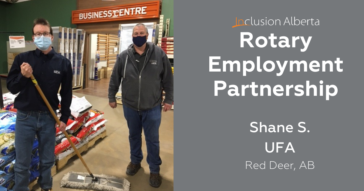 Rotary Employment Partnership, Shane S at UFA Red Deer, AB. Shane poses in a UFA store holding a mop, next to his colleague.